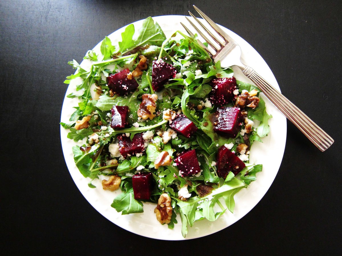 Arugula Beet Salad with Candied Walnuts and Goat Cheese from https://www.paintthekitchenred.com/