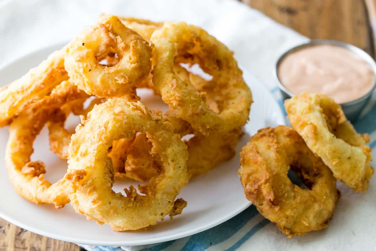 Crispy Onion Rings Recipe with Dipping Sauce from https://natashaskitchen.com/