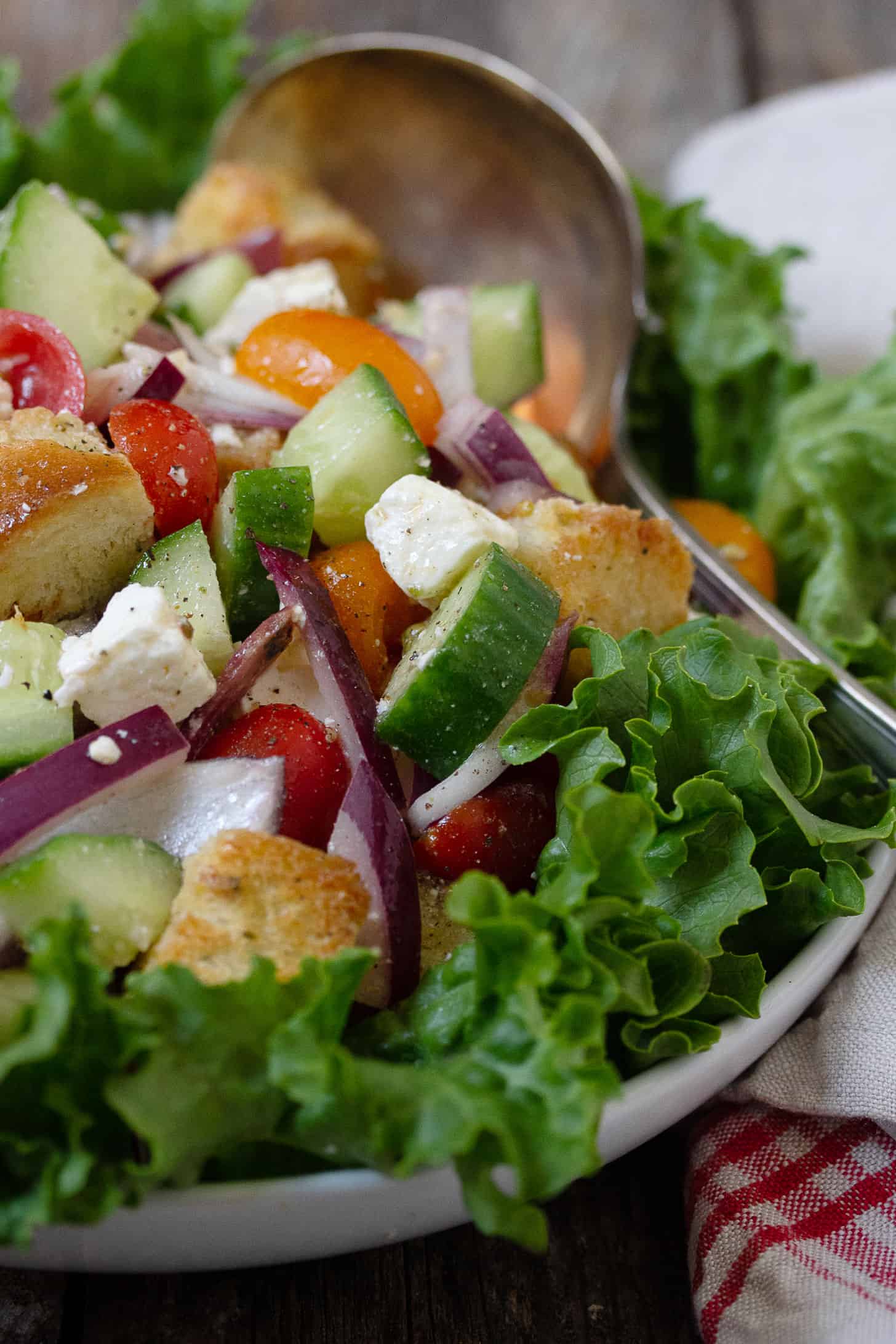 Greek Panzanella Salad from https://www.seasonsandsuppers.ca/