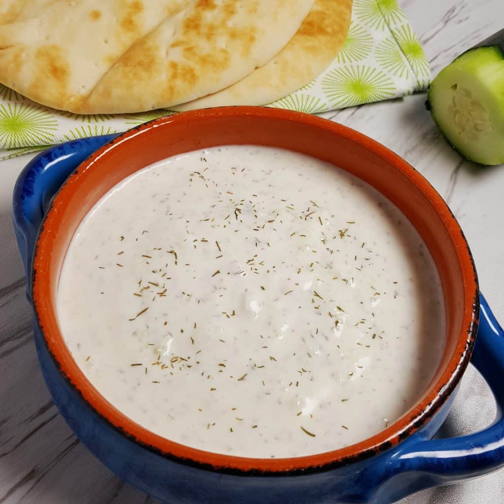Greek Tzatziki Sauce Recipe {Garlic Cucumber Yogurt Dip} from https://thisoldgal.com/