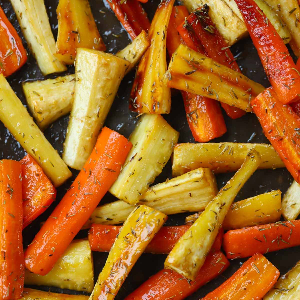 Honey Roasted Carrots and Parsnips from https://www.tamingtwins.com/