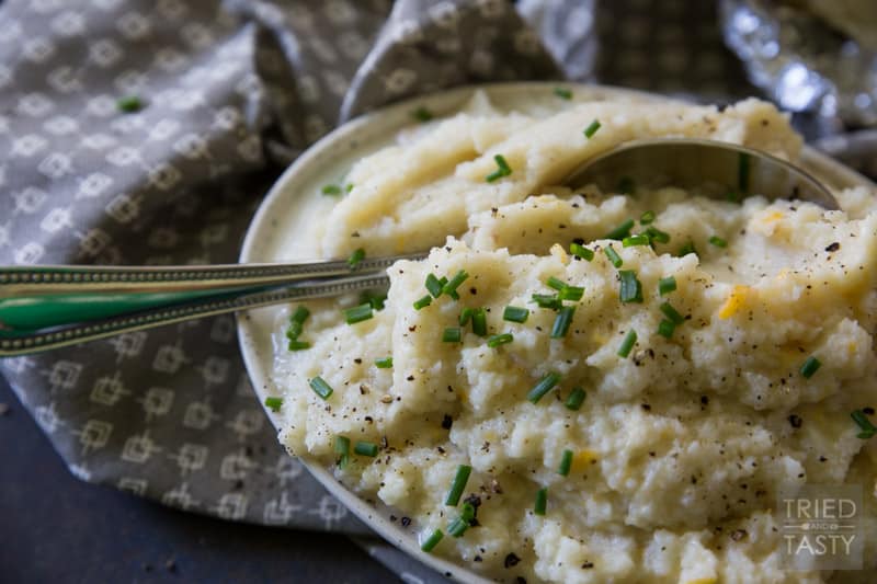 Cheesy Roasted Garlic Mashed Cauliflower from https://triedandtasty.com/