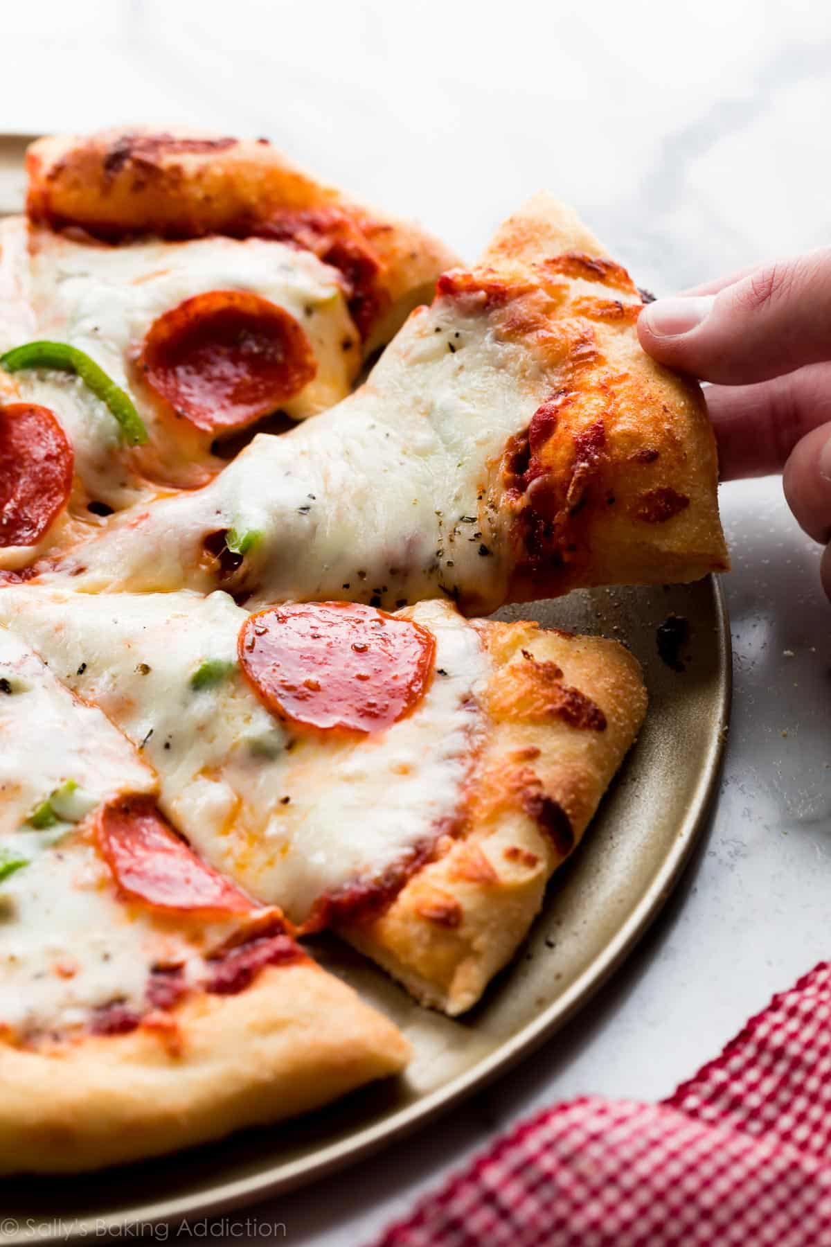 Easy Homemade Pizza Dough from https://sallysbakingaddiction.com/