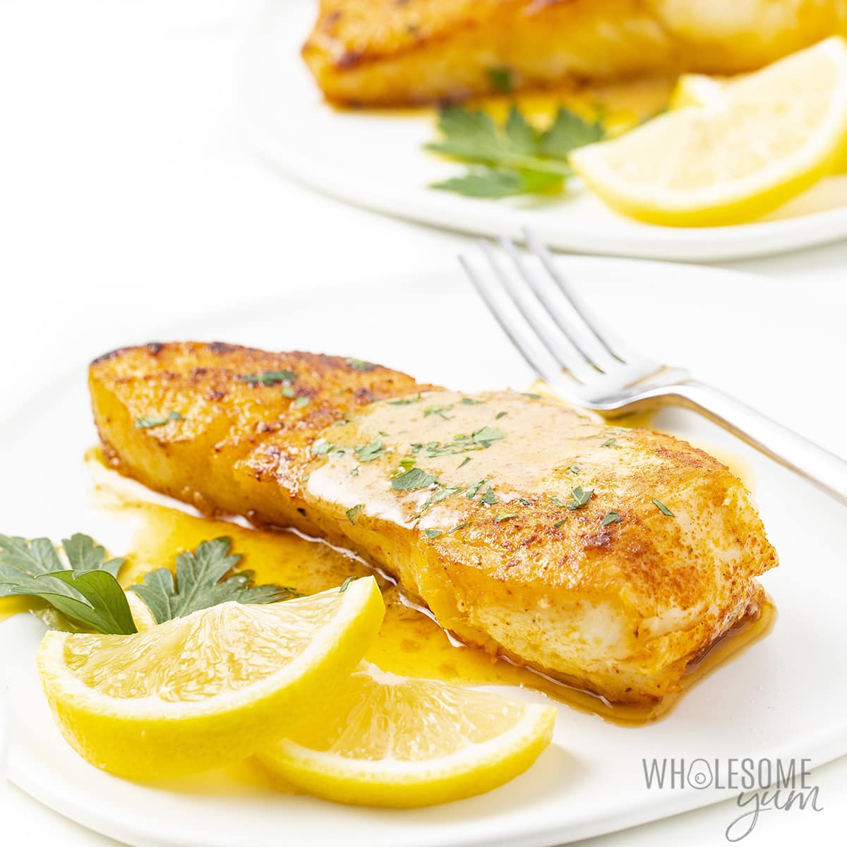 Halibut Recipe (With Lemon Butter Sauce) from https://www.wholesomeyum.com/