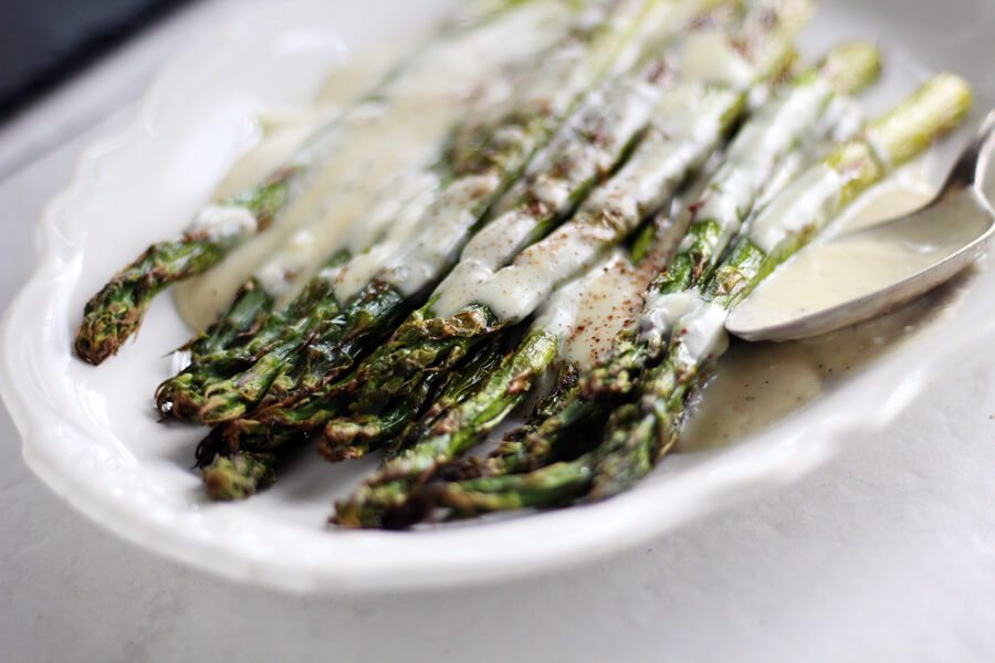 Roasted Asparagus with White Cheddar Cheese Sauce from https://buythiscookthat.com/