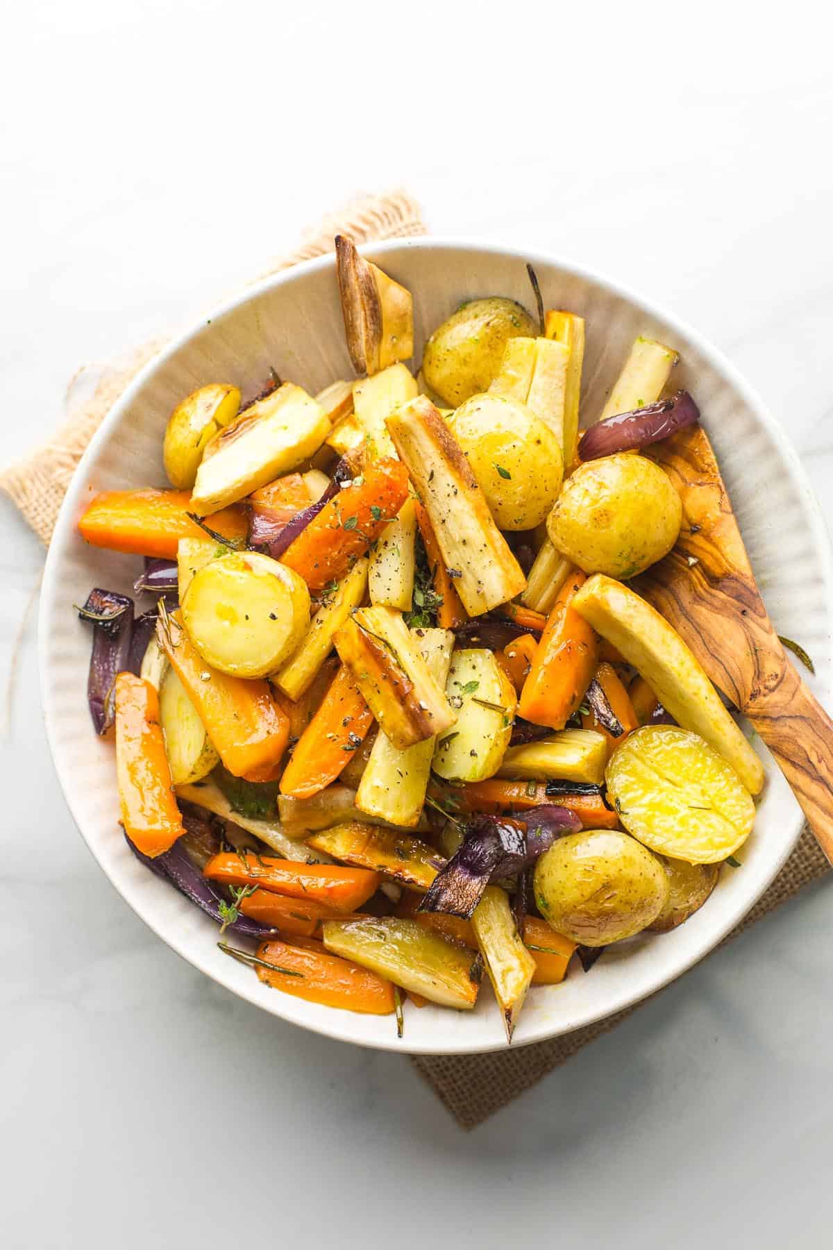 Roasted Root Vegetables with Herb Dressing from https://www.asaucykitchen.com/