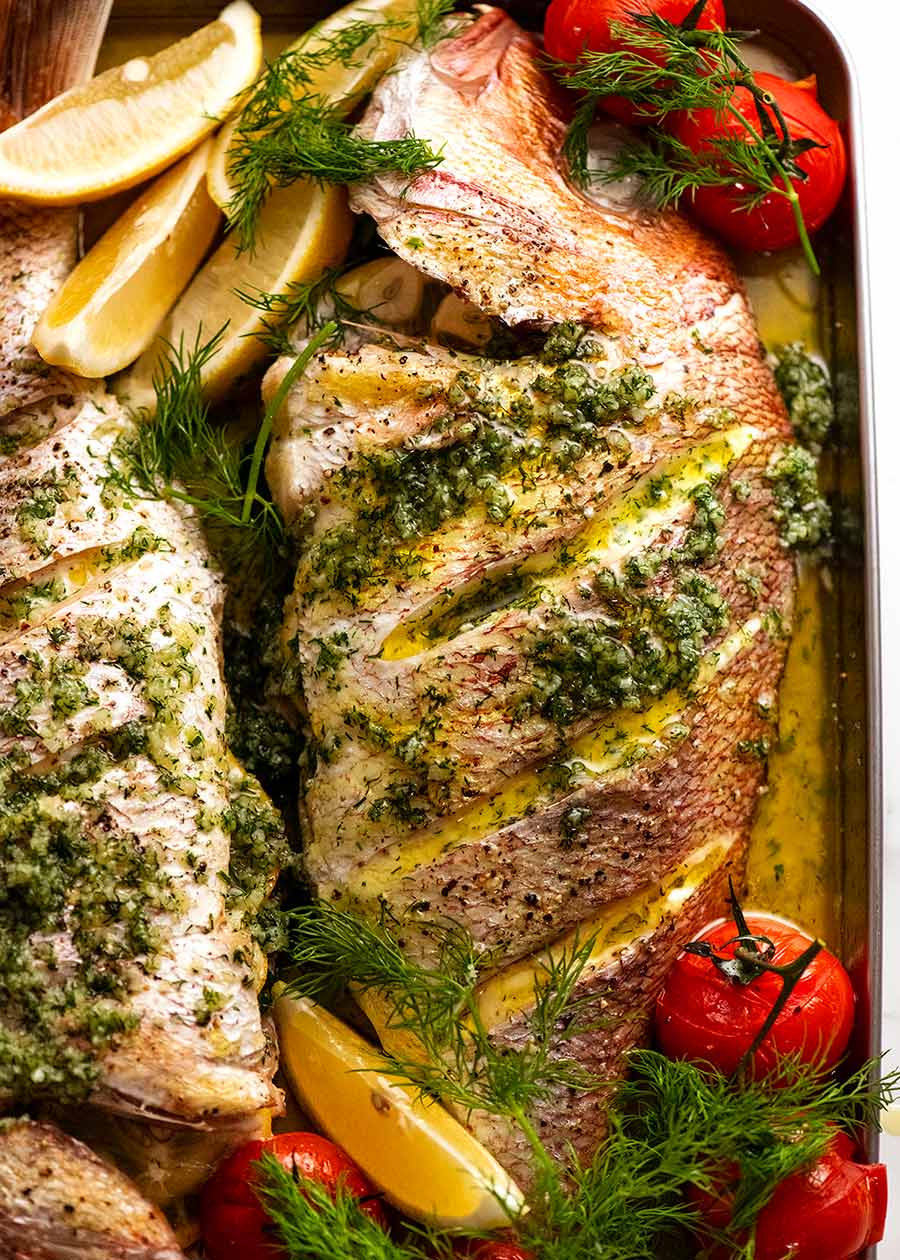 Whole Baked Fish – Herb-stuffed with Garlic & Dill Butter Sauce from https://www.recipetineats.com/