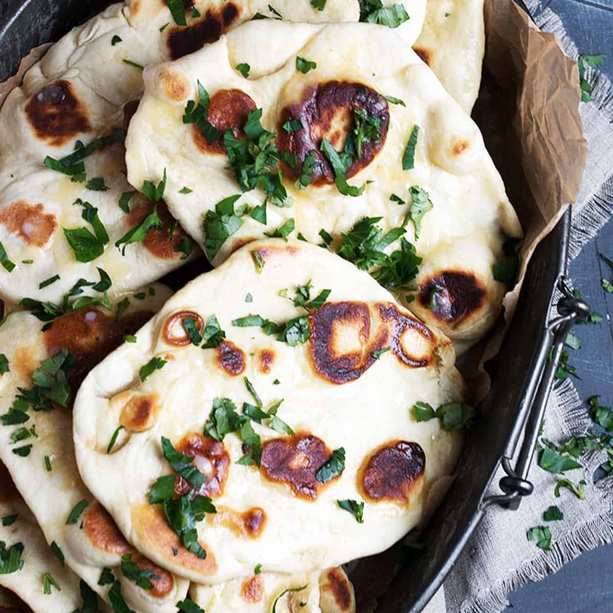 Herb and Garlic Naan Bread from https://www.seasonsandsuppers.ca/