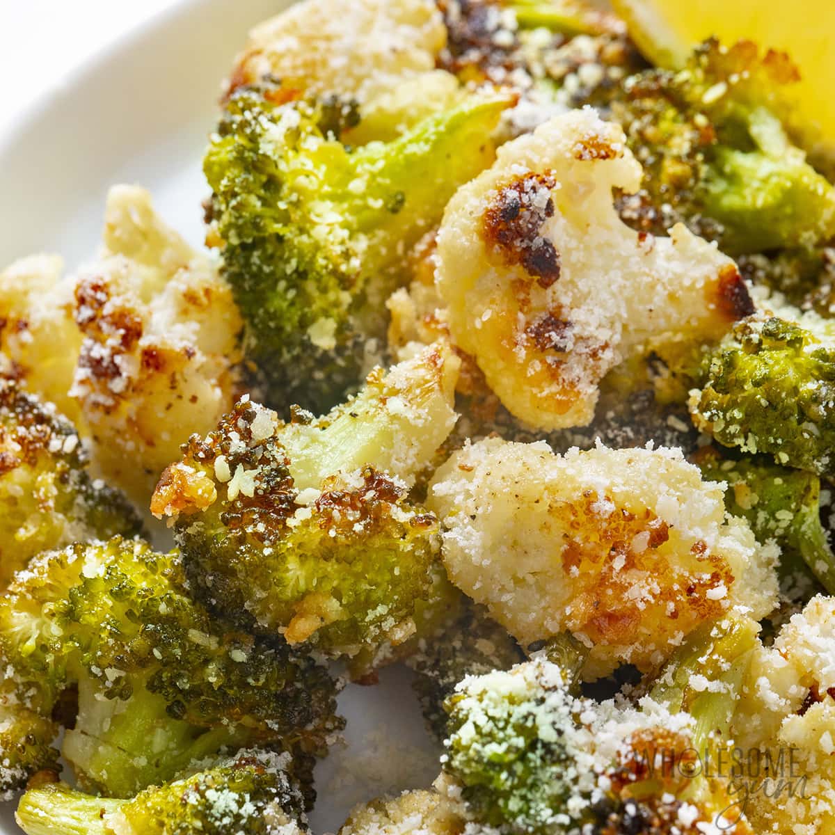 Roasted Broccoli and Cauliflower Recipe (Easy!) from https://www.wholesomeyum.com/