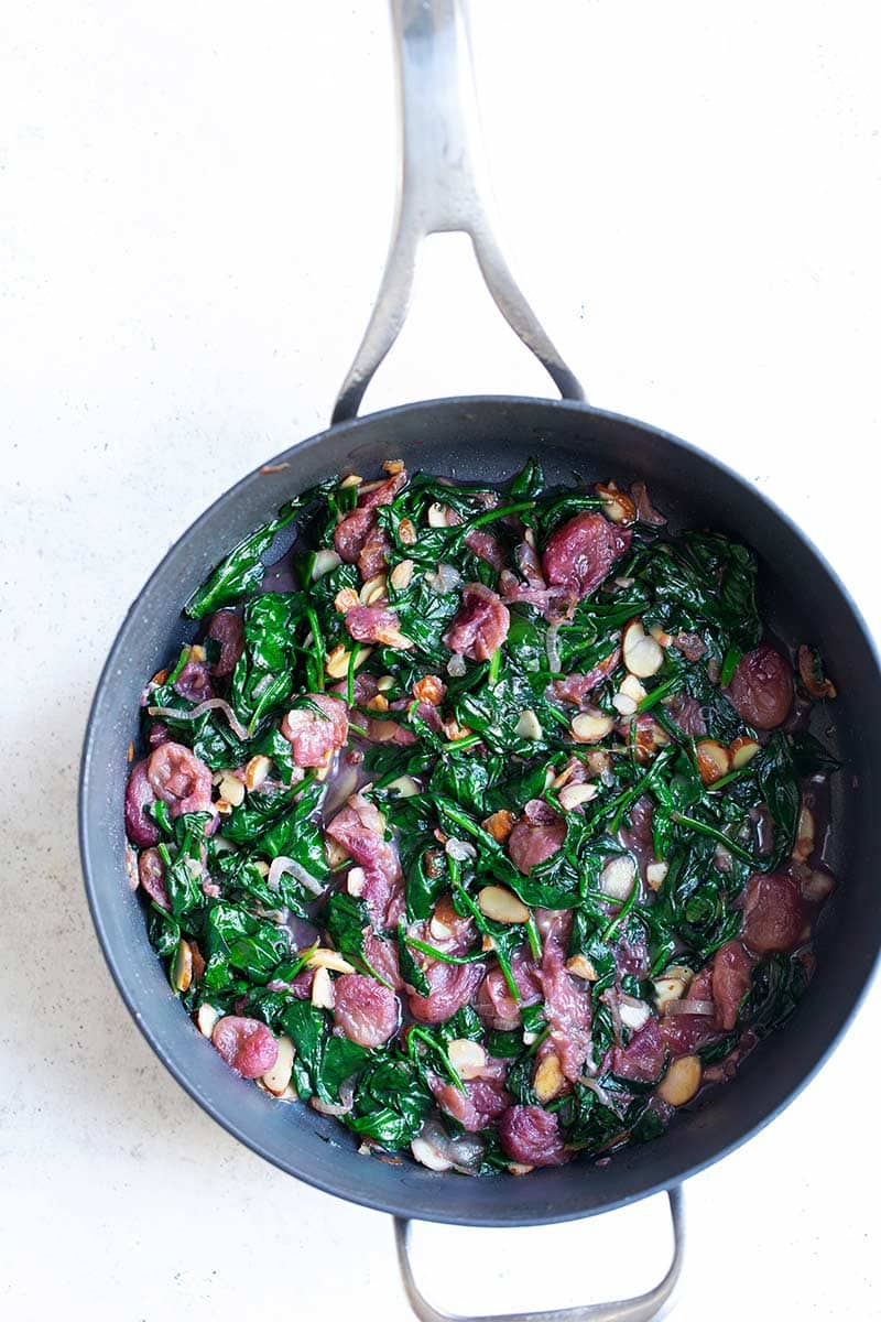 Sautéed Spinach with Grapes and Almonds from https://www.savorysimple.net/