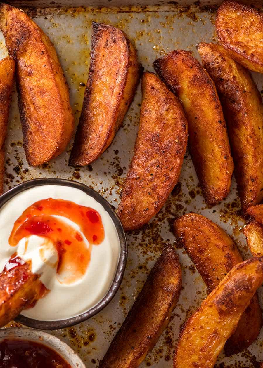 Seasoned Baked Potato Wedges from https://www.recipetineats.com/